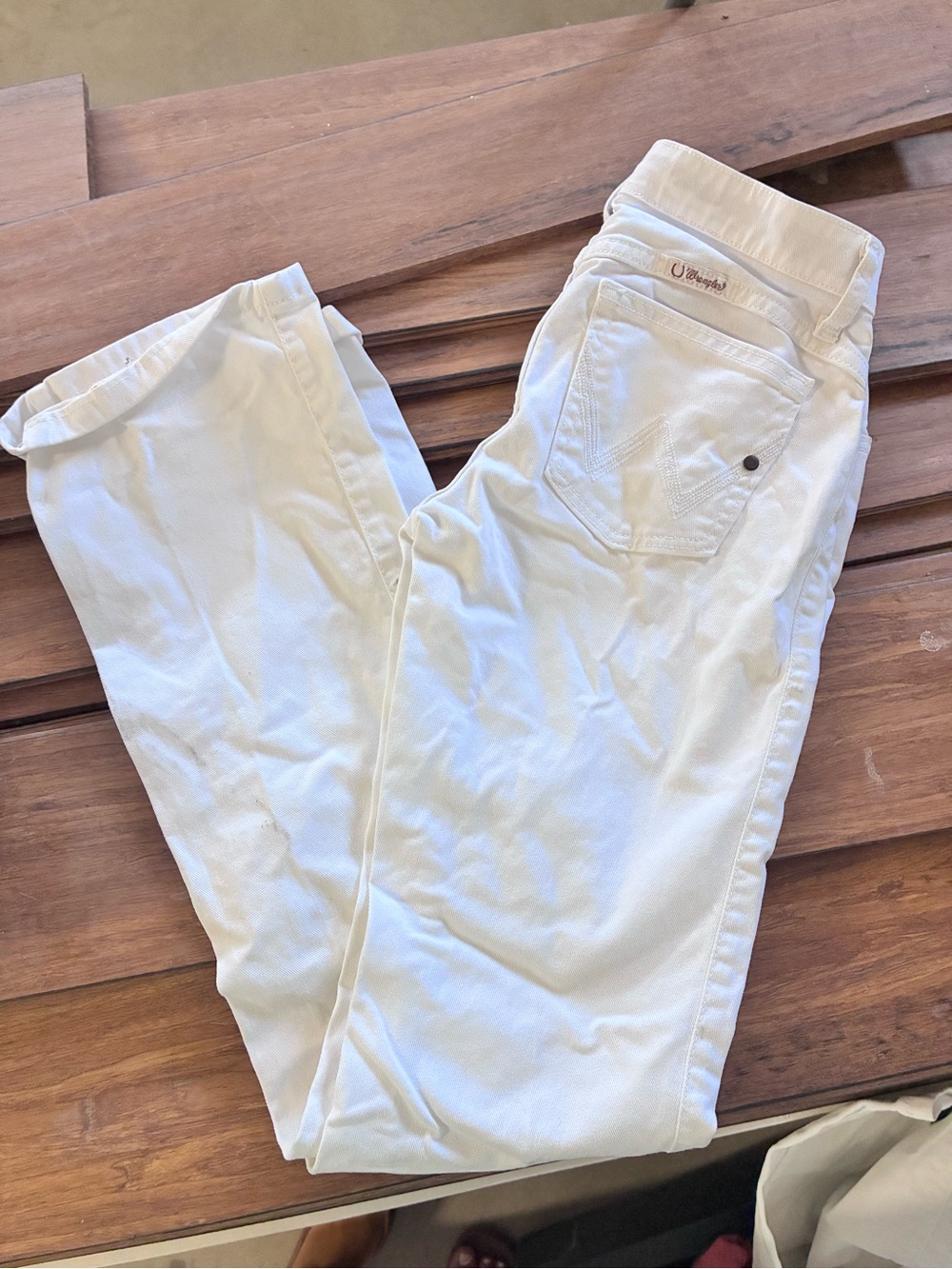 White Wrangler Slim Jeans